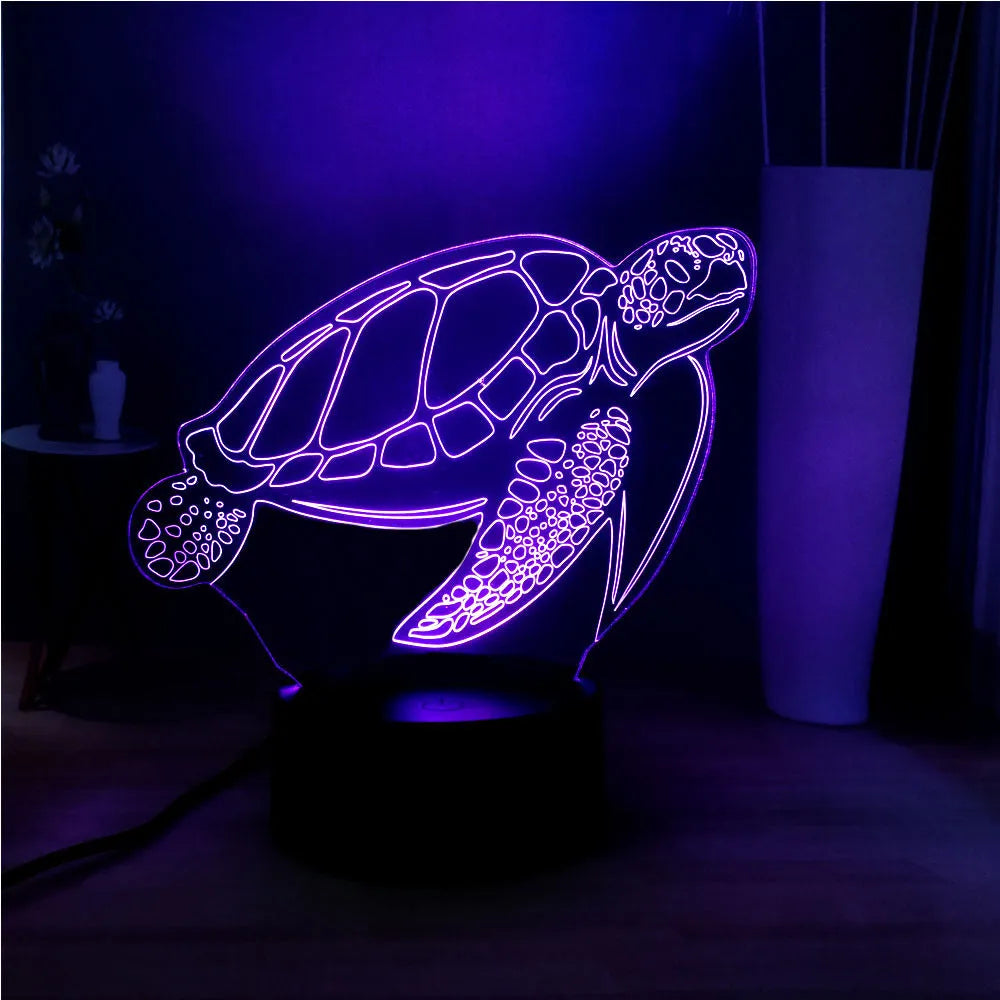 3D LED turtle night light with acrylic base showing multi-colour illumination and remote control