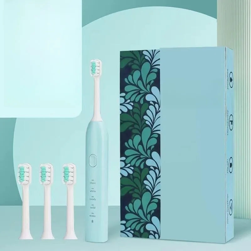 Yellow rechargeable electric toothbrush with small duck design, soft bristles, and a compact size.
