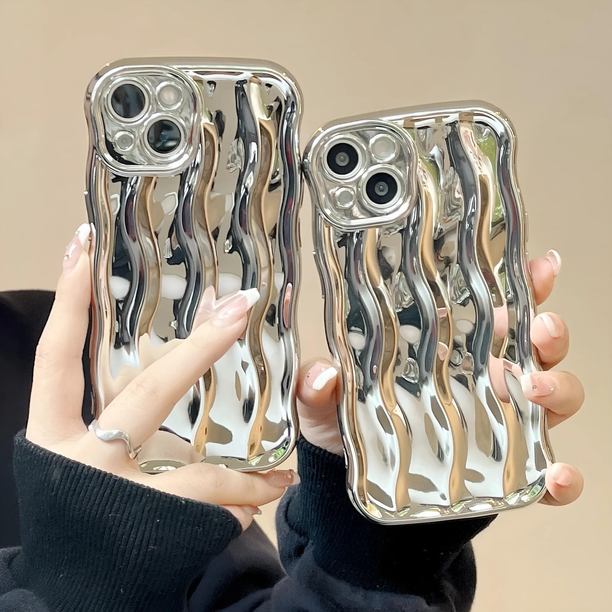 Electroplating three-dimensional wave stripe iPhone 17 protective case in silver plated colour showing back design