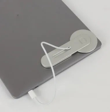 Aluminium magnetic laptop expansion bracket in black colour showing arc magnet row and CNC machined construction
