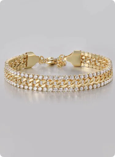 Gold tennis bracelet with titanium steel construction and artificial gemstone inlay on wrist