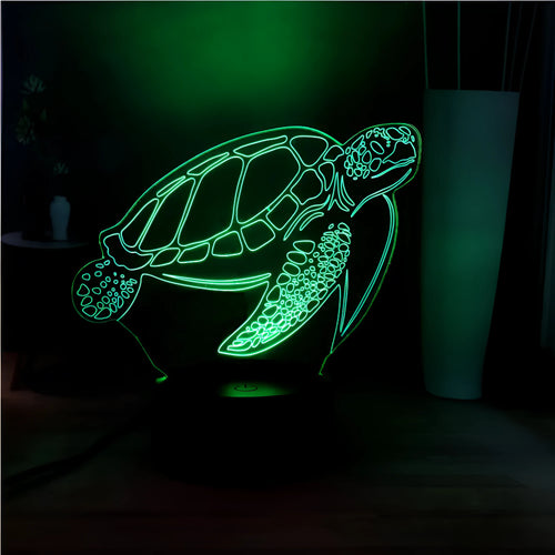 3D LED turtle night light with acrylic base showing multi-colour illumination and remote control