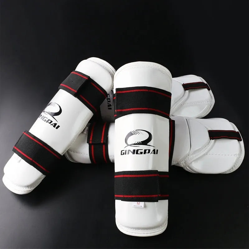 Taekwondo protective gear set showing arm guard, elbow arm guard, and leg protector made from black PU EVA foam.