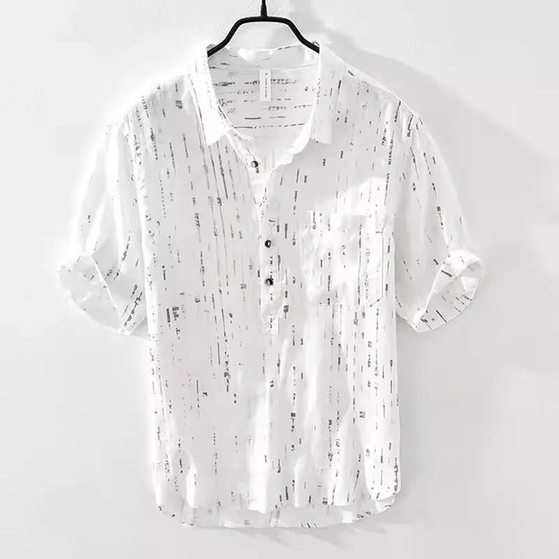 Men's loose fit short-sleeved polo shirt with lapel collar in black, laid flat.