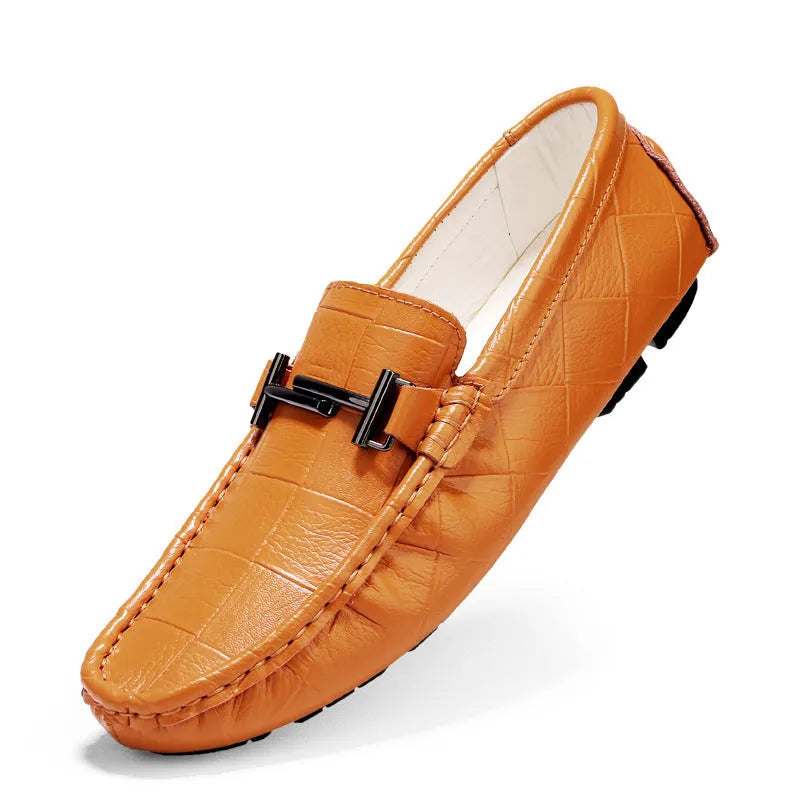 Men's brown leather casual loafers with a silver buckle on the upper, shown on a white background.