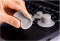 Grey plastic laptop cooling pads, two large and two small, placed under a mini notebook.