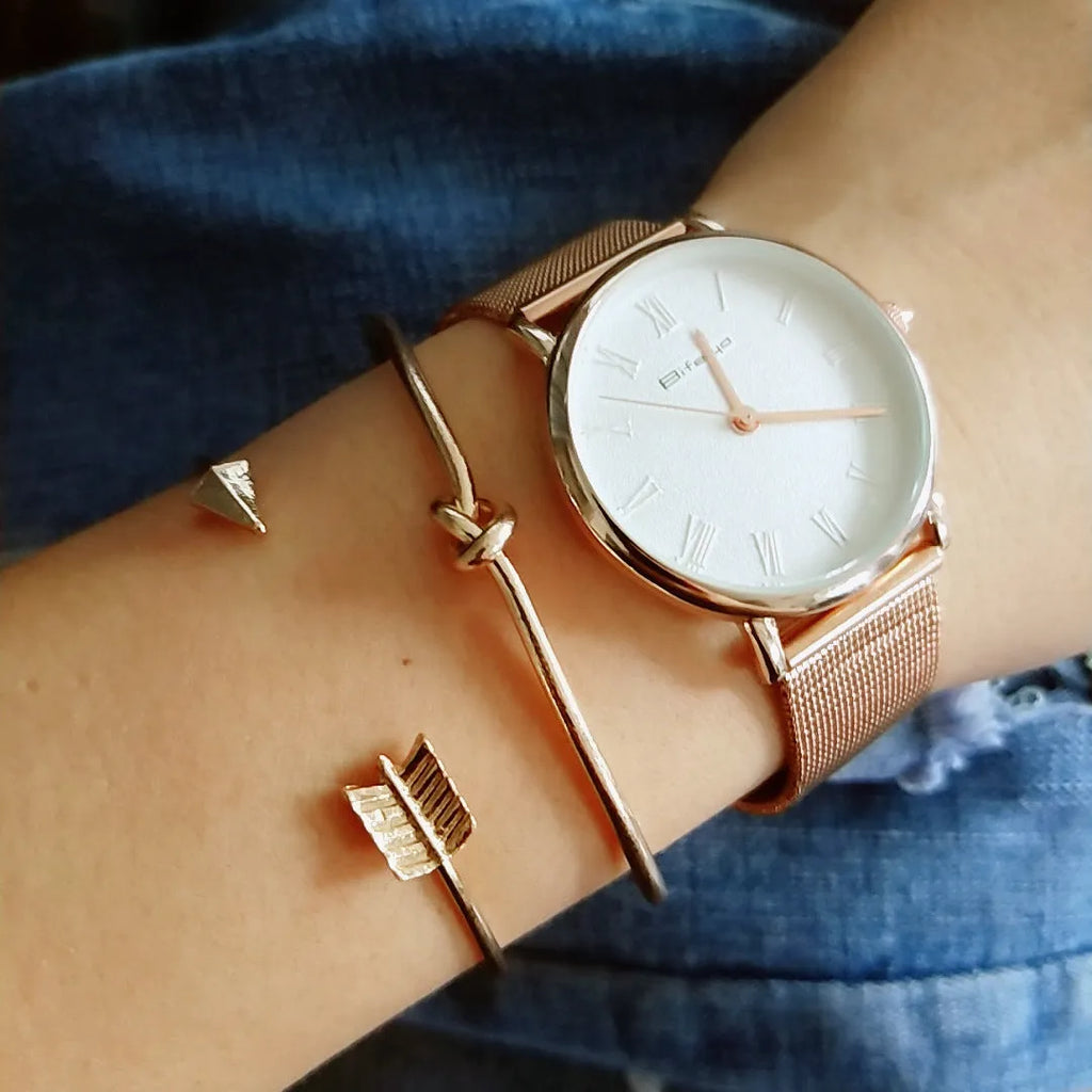 Gold vintage cuff bracelet with knotted arrow design for women