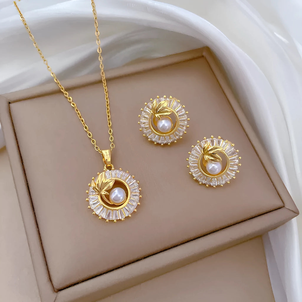 Titanium steel geometric leaves jewellery suite with personalised round ring pendant necklace and matching stud earrings