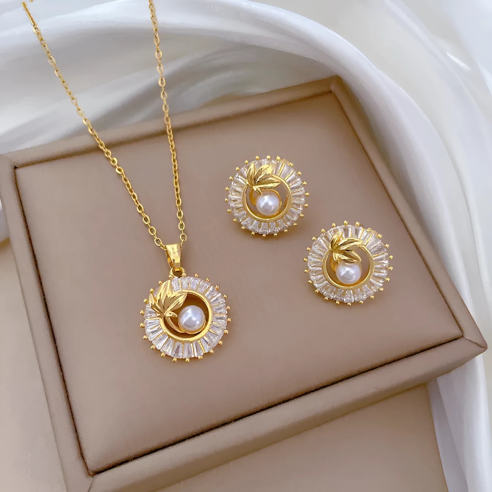 Titanium steel geometric leaves jewellery suite with personalised round ring pendant necklace and matching stud earrings