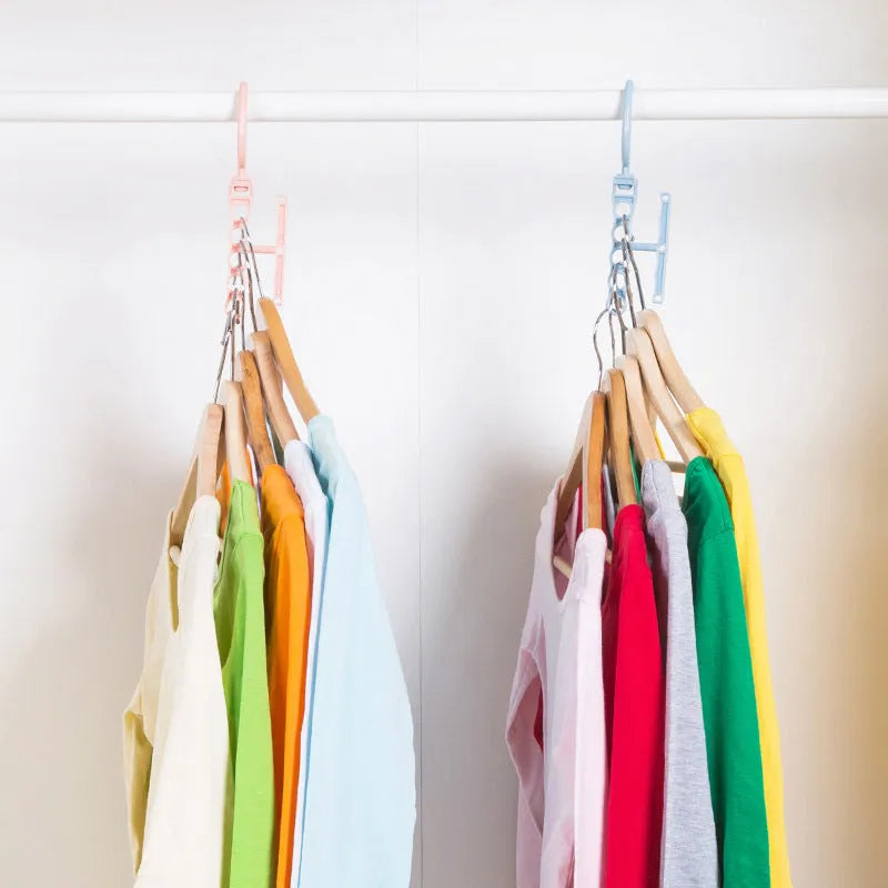 Blue revolving wardrobe hanger with five rotating branches and a top handle