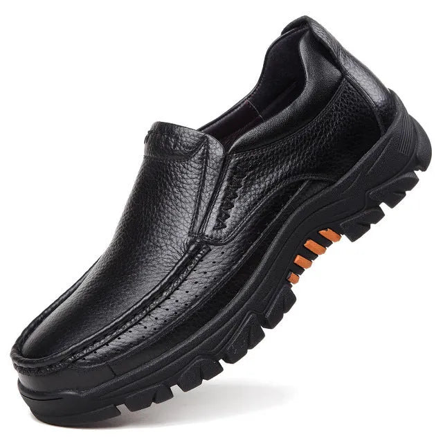 Men's black and brown business casual slip-on shoes made of cowhide leather with a rubber sole.
