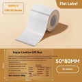 Roll of transparent waterproof adhesive labels showing rectangular and round sizes on thermal synthetic paper.