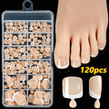 Open box showing 120 nude false toe nails with French white edges and a full-square short shape.