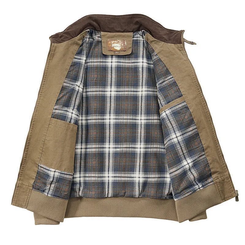 Men's beige washed cotton flight jacket on a hanger, showing its simple design and cotton fabric texture.