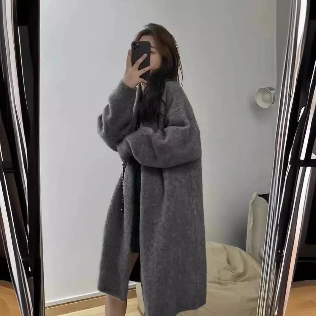 Women's V-neck knitted cardigan in mid-length style with long sleeves and loose fit