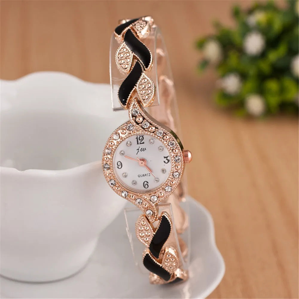 Women's love strap diamond watch with matching earrings, ring, and necklace in black suit option