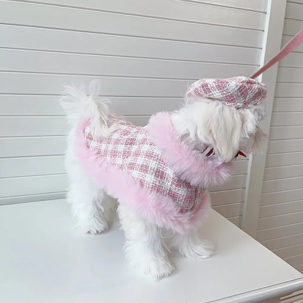 Pink cat costume with cloak and hand holding rope on cat, showing chest and back traction design