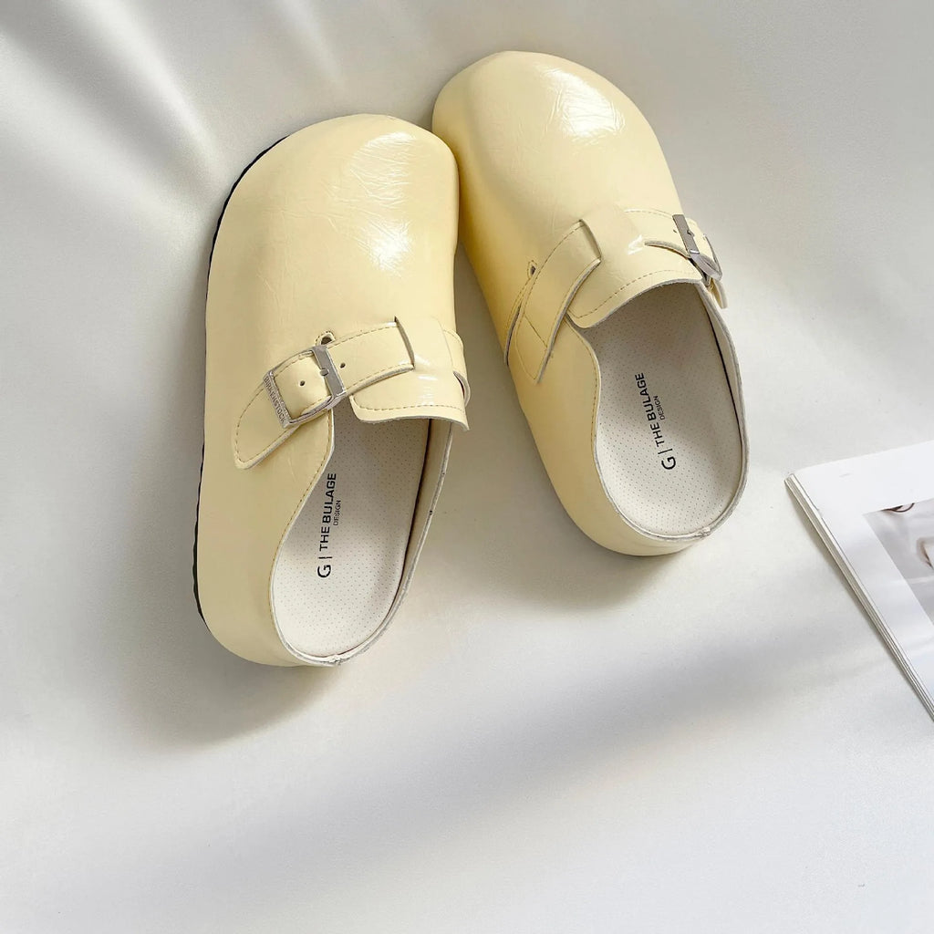 Flat buckle casual sneakers with round toe in yellow, creamy-white, silver, or black colours