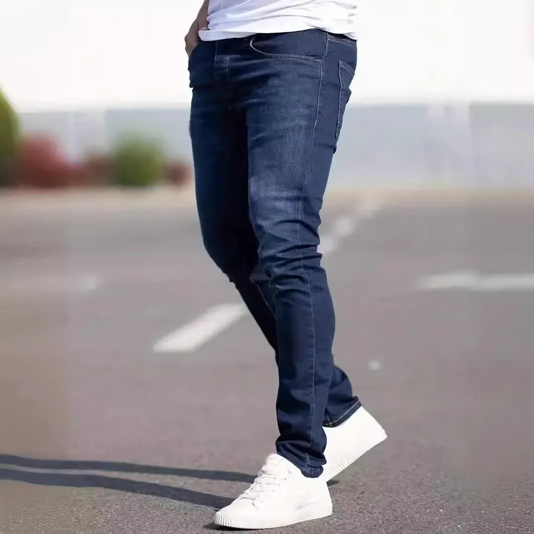 Men's dark blue slim jeans with medium elastic cotton fabric and skinny leg style