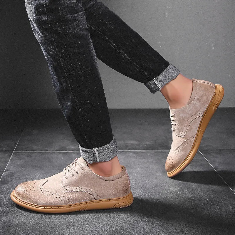 Men's black leather business lace-up shoes with retro stitching on a non-slip rubber sole.