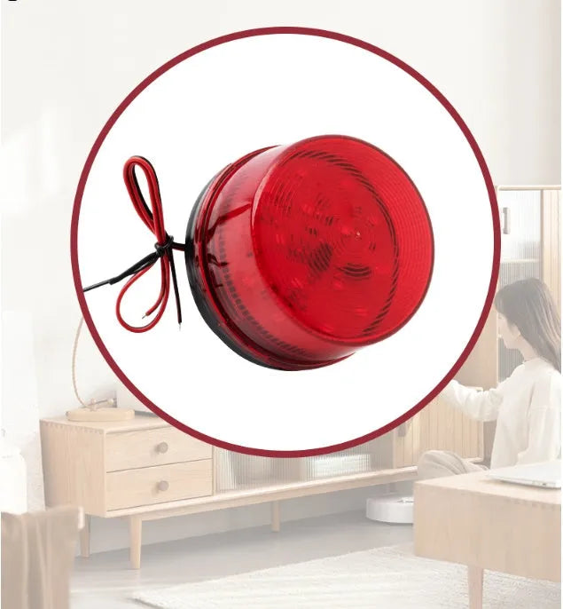 Small cylindrical warning alarm light with flashing beacon and audible alert for fire protection systems