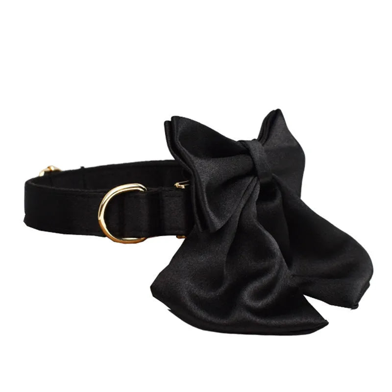 Cloth dog collar and leash set with matching vest and bow tie in four adjustable sizes