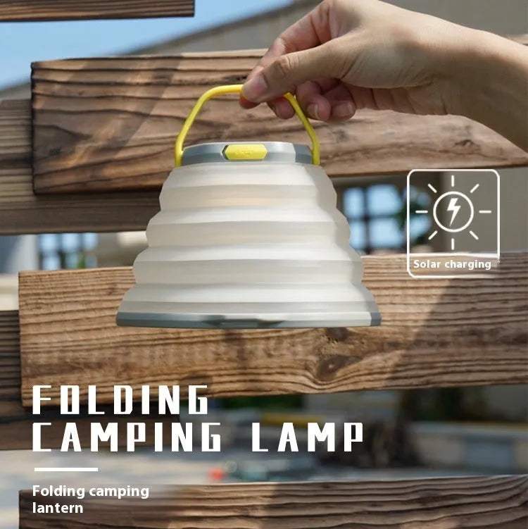 White rechargeable camping lamp with large battery capacity and one control button.