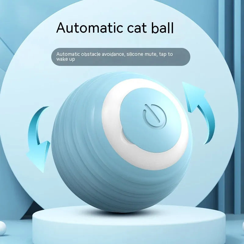 Blue automatic moving ball cat toy with charging cable on flat surface