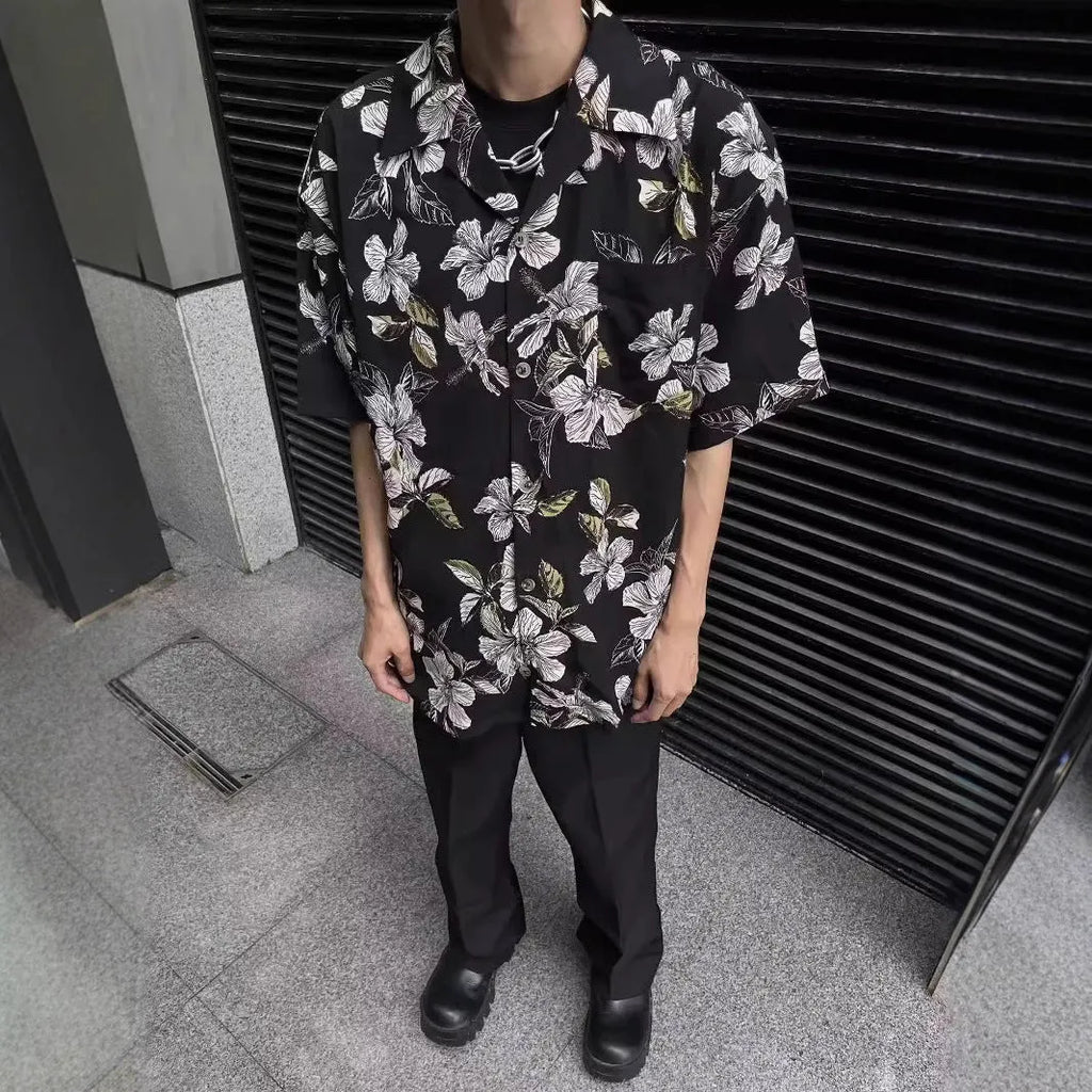 Black men's vintage Cuban collar shirt with floral print, made from thin ice silk fabric for summer.