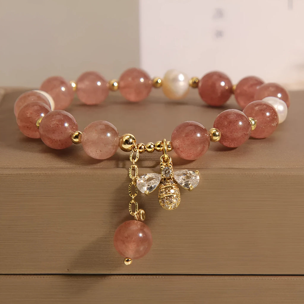 Women's strawberry quartz and freshwater pearl bracelet with zircon details and alloy charms