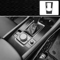 Car interior decorative film sticker kit showing centre console, instrument panel, and trim pieces
