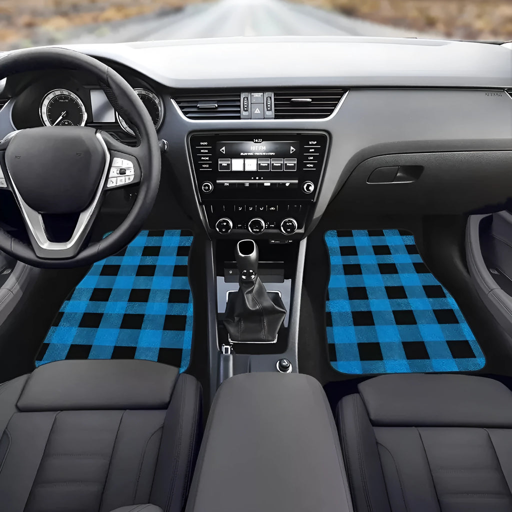 Four-piece set of thick black rubber car floor mats with anti-slip backing for universal vehicle fit.