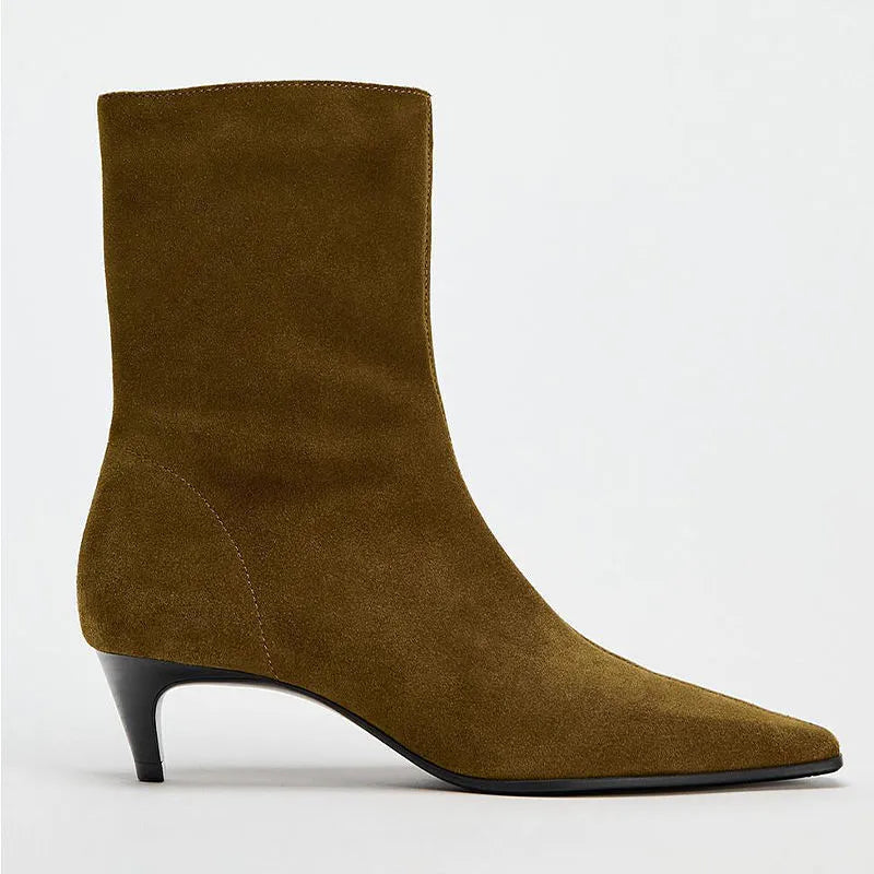 Brown women's retro ankle boots with a square toe, side zip, and a mid-height stiletto heel on a white background.
