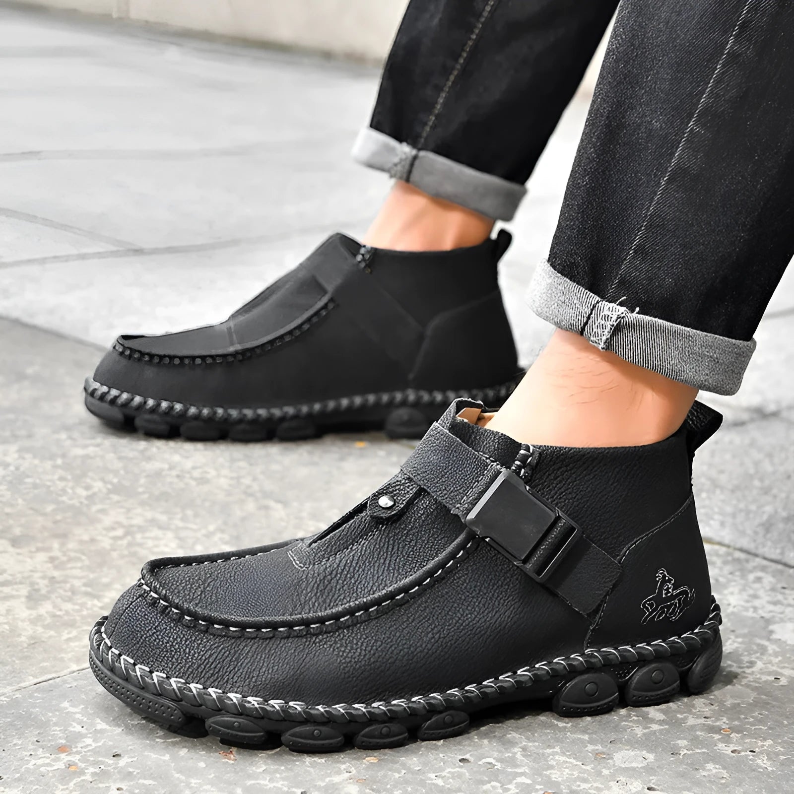 Black handmade stitch slip-on lazy shoes flat bottom low heel on wooden floor