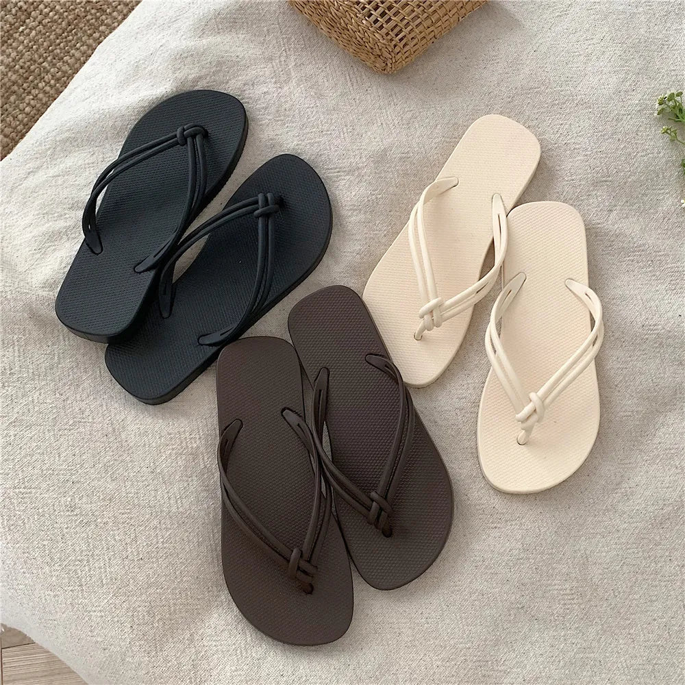 Men's PVC flip flops in a toe-covering style with a non-slip sole, shown in one of the available colours