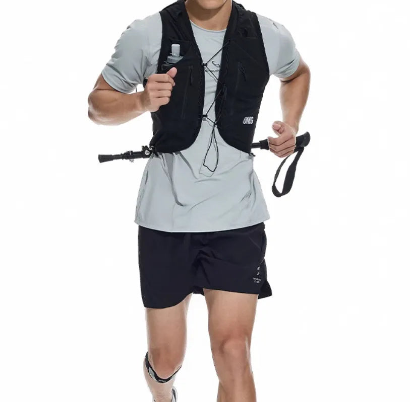 Men's black running shorts with laser-punched detail and four-point stitching on stretch spandex fabric.