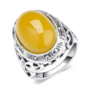 Geometric retro alloy ring with fluorescent beeswax centrepiece in antique silver Amber colour