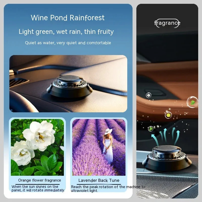 Solar-powered kinetic car air freshener with rotating double rings on a black plastic base.