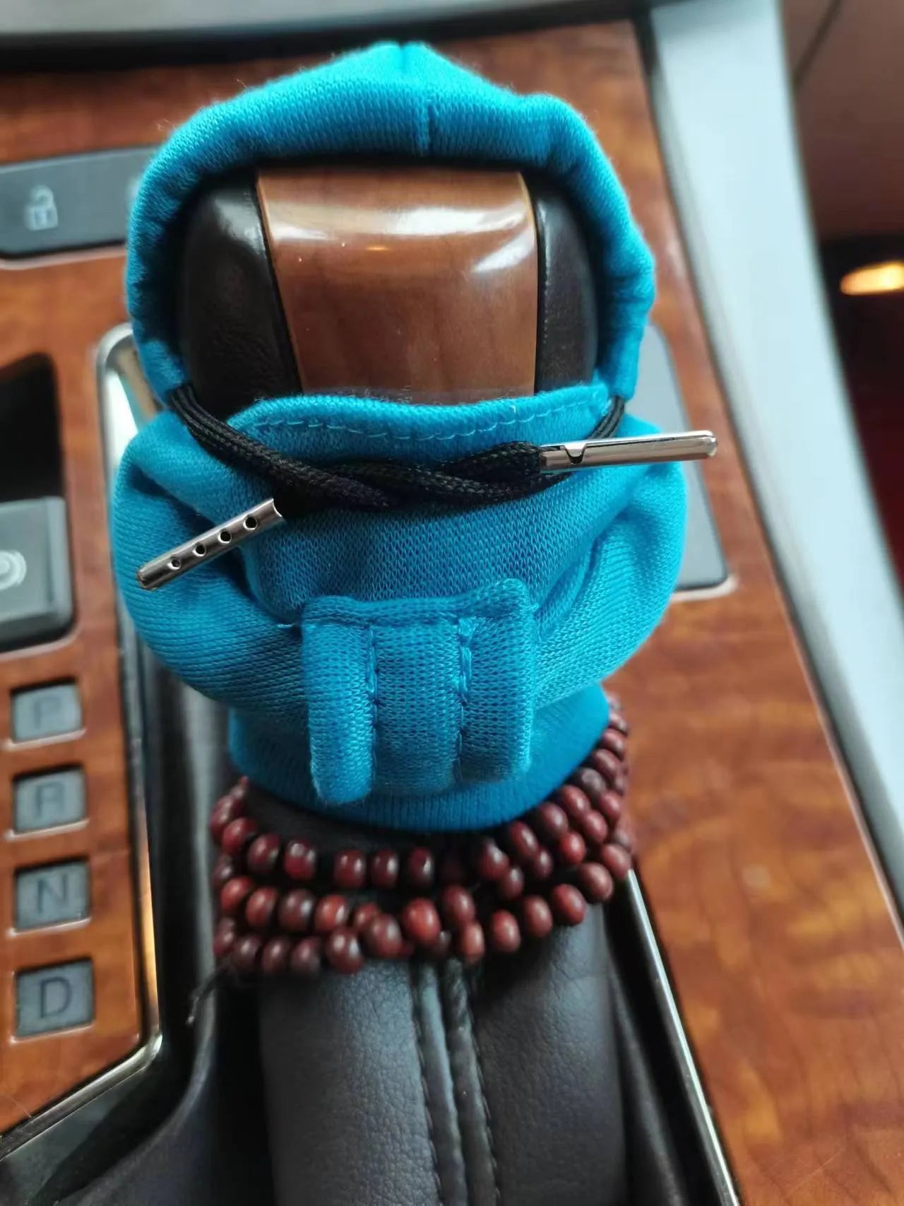 Dutch velvet car gear handle sleeve in multiple colour options on a car gear stick