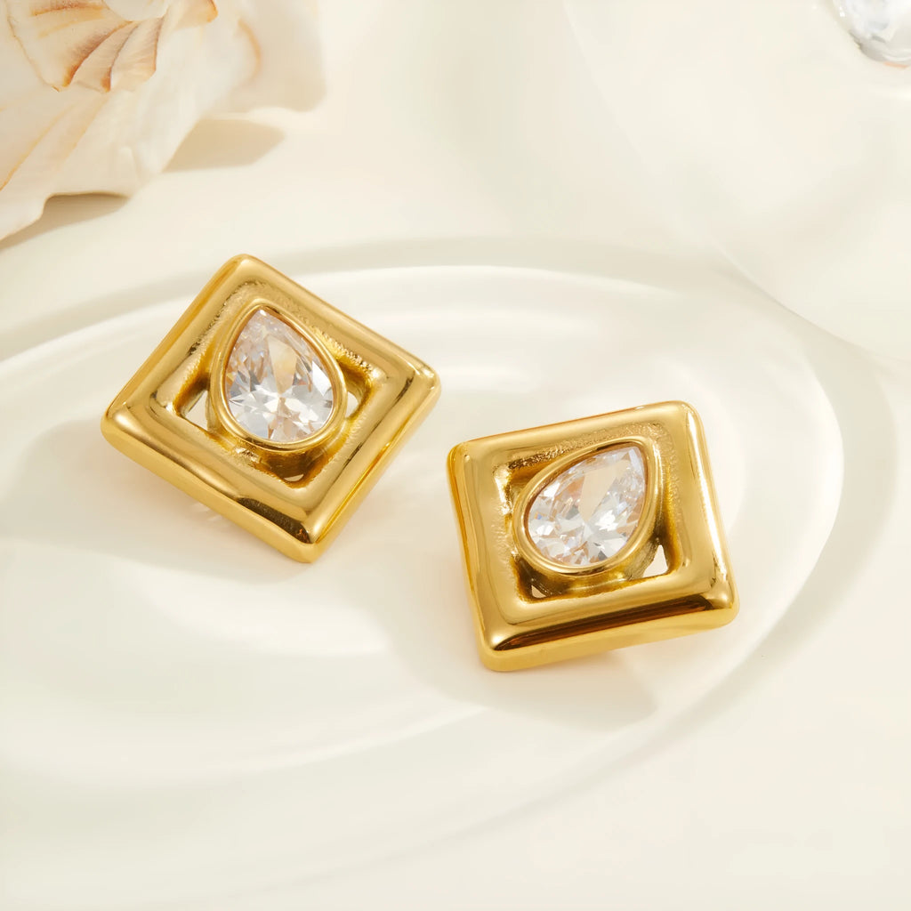Gold geometric stud earrings with water drop zircon inlaid detail on stainless steel