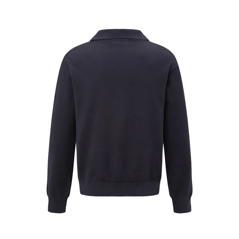 Men's loose fit pullover sweater in beige, black, and dark grey colours on a hanger