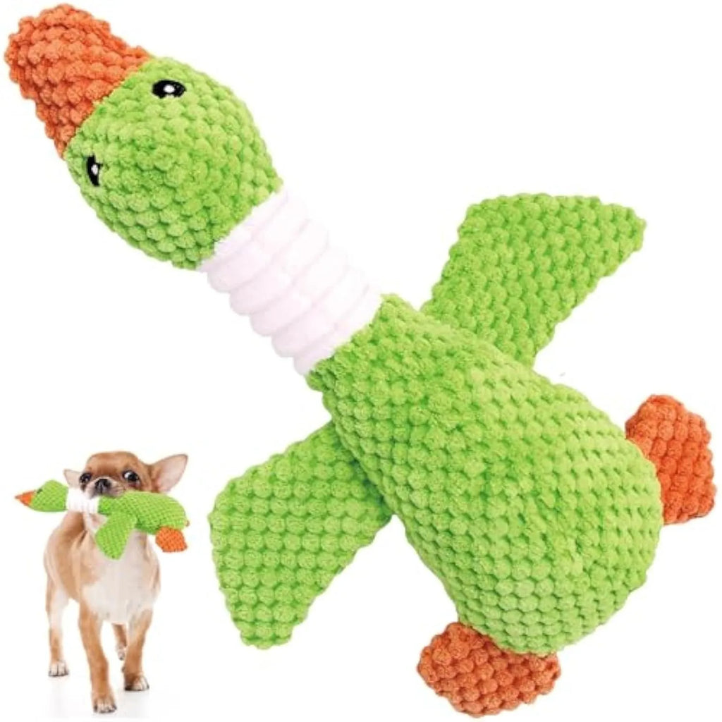 Blue durable pineapple cotton duck plush dog toy with squeakers on wooden floor