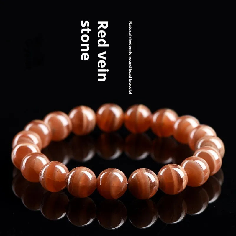 Natural Old Mine Rhodochrosite round beads bracelet with geometric Ruyi design elements
