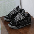 Niche couple heightened sneakers in black with low heel and front lace-up design