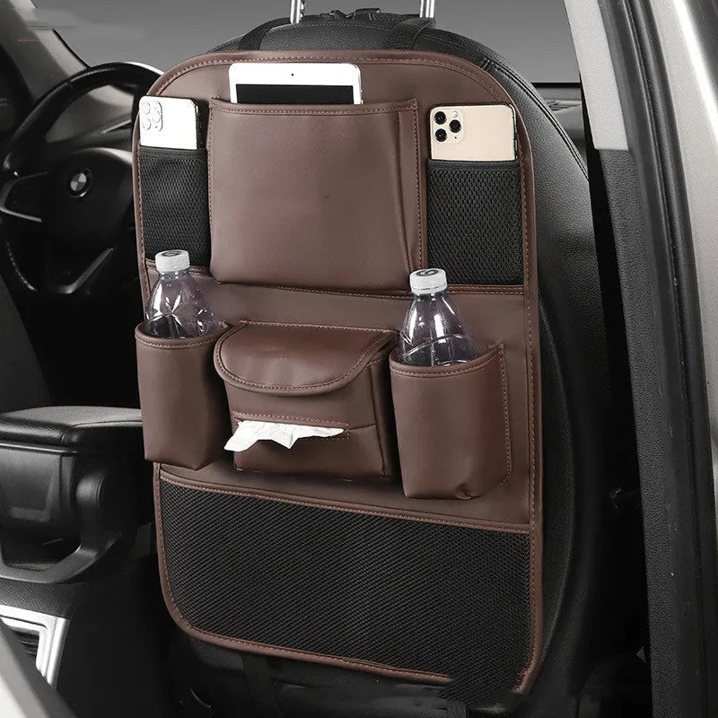 Black leather car seat back storage bag hanging on a vehicle seat.