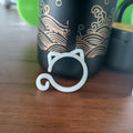 Cat-shaped plastic plant clip in red, yellow, green, or white colours for gardening stem support