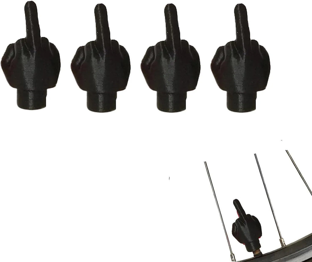 Four latex tyre valve dust cover caps in black and skin colours for car tyre protection