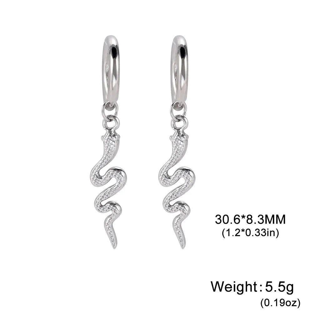 A pair of vintage-style snake-shaped earrings made from gold plated stainless steel with an ear clip fastening.