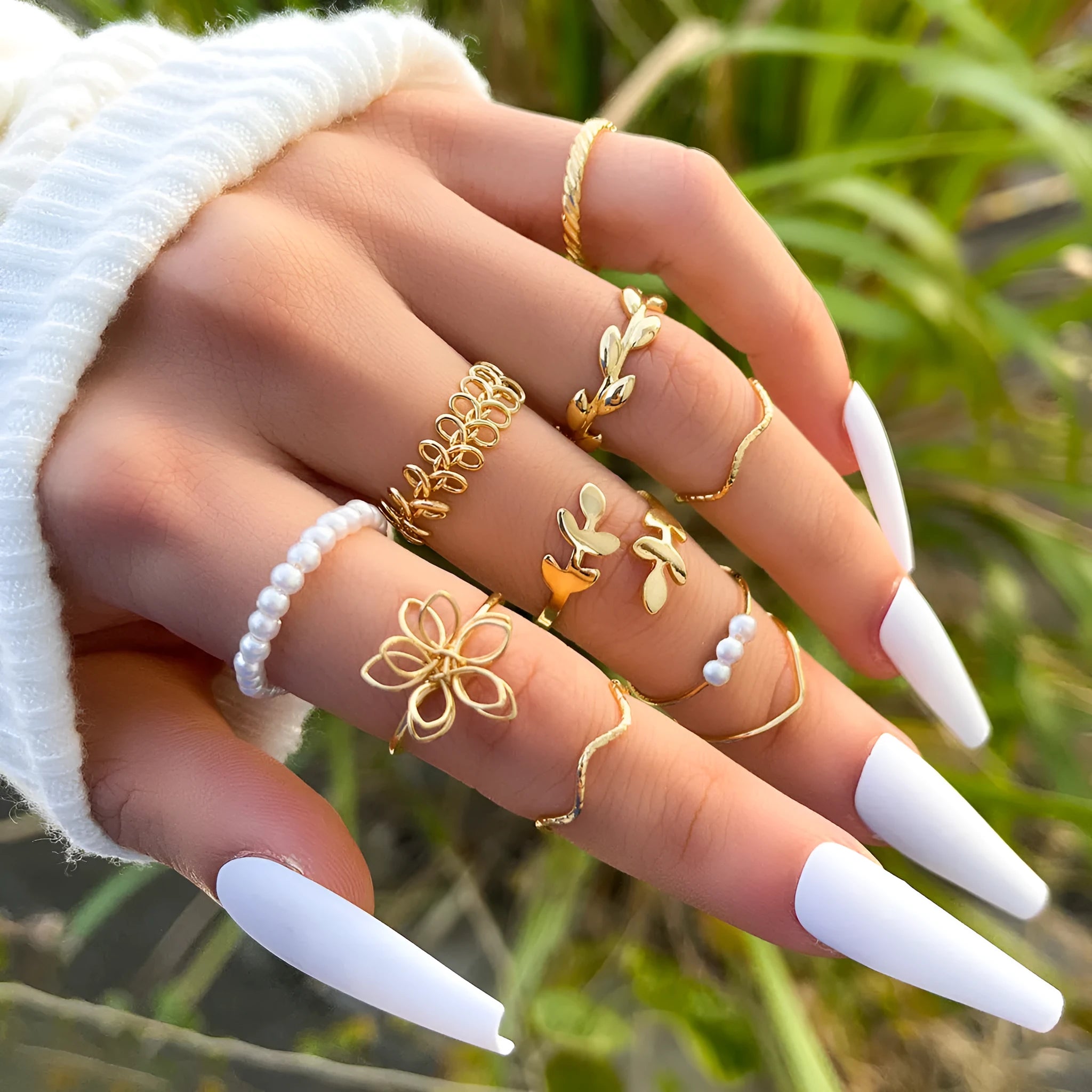 Gold colour openwork flower ring with electroplated glossy finish and floral design