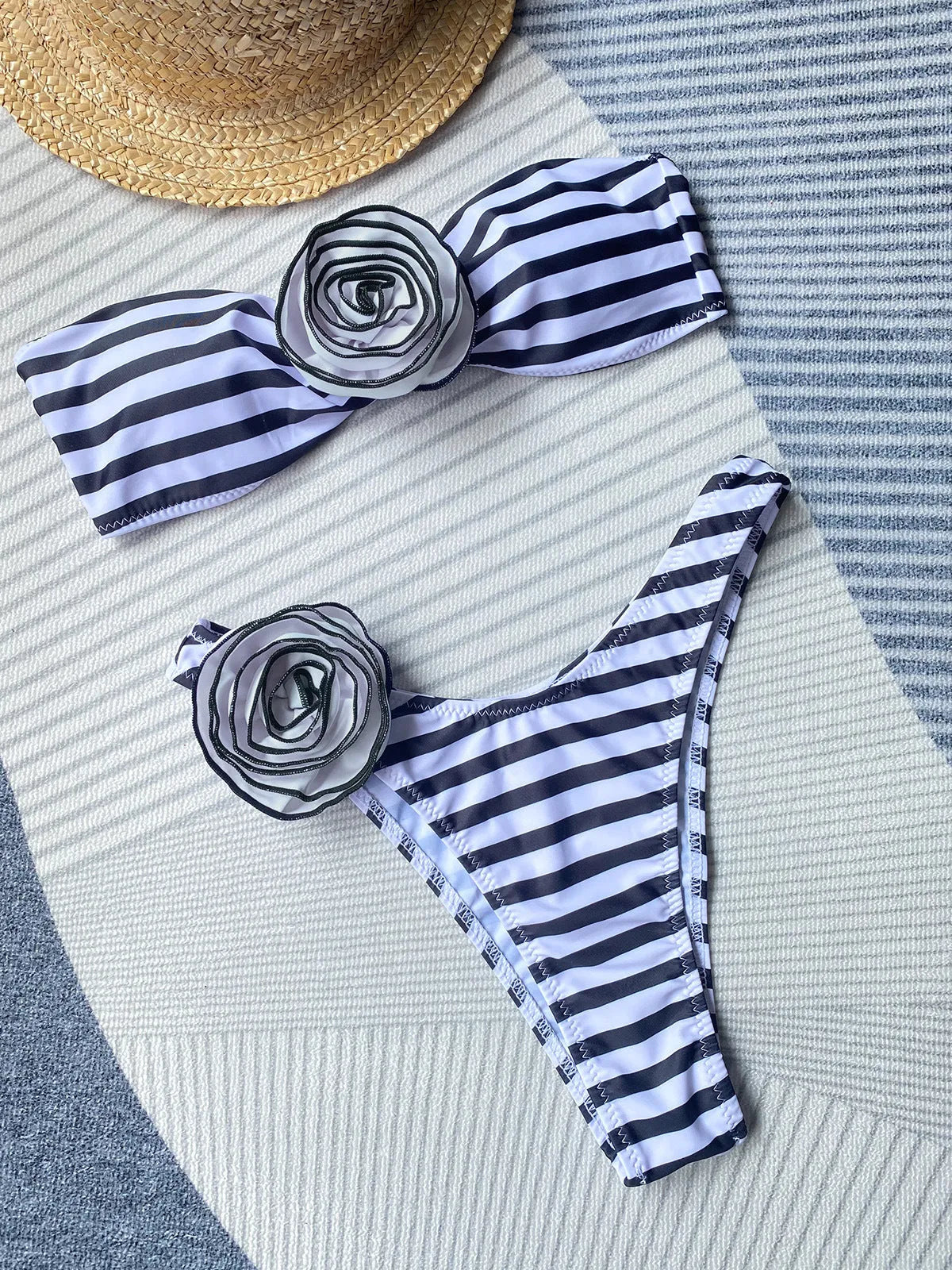 Women's polyester bikini with cross-back tube top and matching shorts in striped pattern